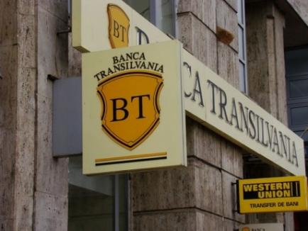 Banca Transilvania se solidarizează cu directorii arestaţi
